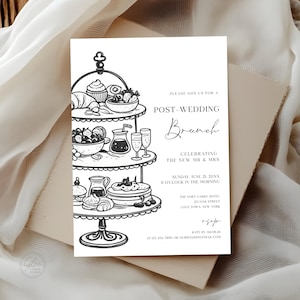 May include: A black and white post-wedding brunch invitation. The invitation features a three-tiered serving stand with illustrations of pastries, fruit, and drinks. Text includes event details and RSVP information.