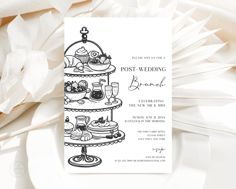 May include: A black and white invitation for a post-wedding brunch. The invitation features a three-tiered serving stand with illustrations of food items like croissants, fruit, and pastries. The text reads "Post-Wedding Brunch" and includes event details.