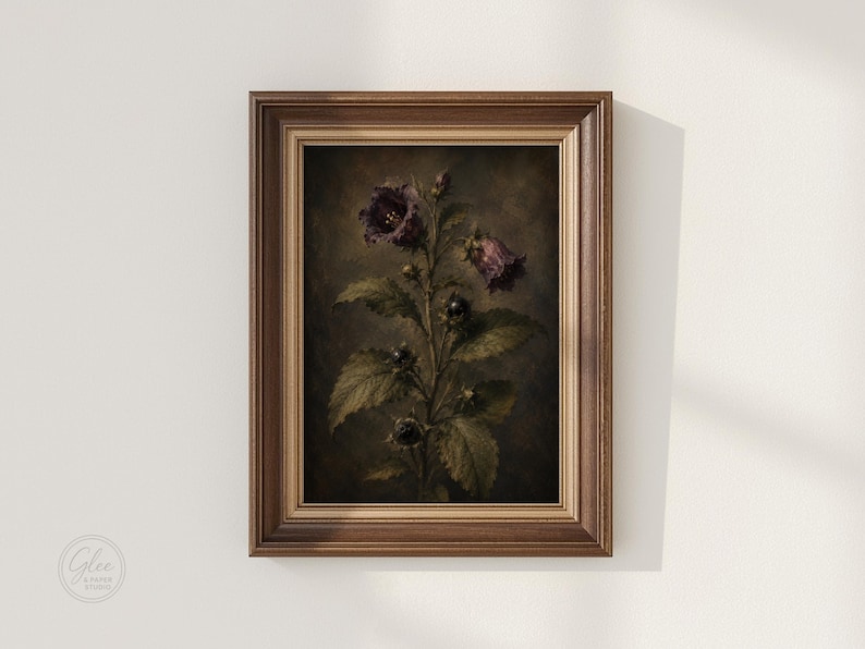 May include: A framed wall art print featuring a dark, moody botanical illustration of a plant with deep purple bell-shaped flowers and green serrated leaves. The artwork is encased in a classic, multi-toned brown wooden frame with a textured finish.