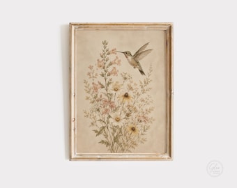 May include: A framed vintage-style print featuring a hummingbird hovering near a cluster of wildflowers. The artwork showcases a soft color palette of beige, pink, and yellow, with a distressed wooden frame. The print evokes a sense of nature and rustic charm.