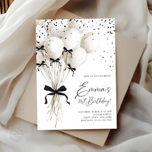 May include: A birthday invitation with white balloons and black ribbons. The text reads "Emma's 21st Birthday!" in a stylish script. The invitation includes event details and RSVP information. The design is set against a neutral background.
