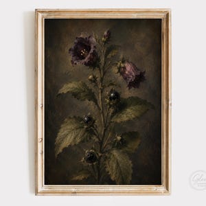 May include: A framed wall art print featuring a dark, moody botanical illustration of a plant with deep purple bell-shaped flowers, dark green serrated leaves, and small black berries against a textured, shadowy brown and charcoal background.