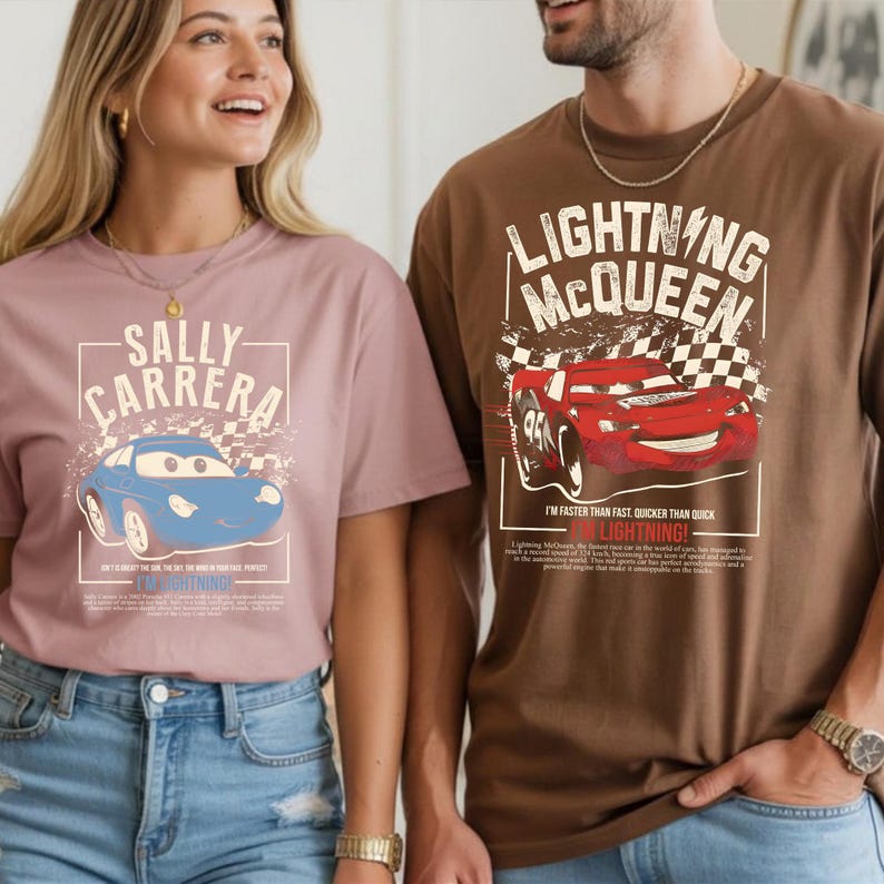 May include: Two t-shirts featuring characters from the movie Cars. One is dusty rose with a blue car and the text "Sally Carrera". The other is brown with a red car and the text "Lightning McQueen".