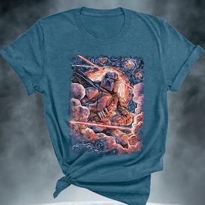 May include: Teal-colored t-shirt featuring a detailed illustration of a character in armor, set against a starry night sky with red laser beams. The artwork is reminiscent of a famous painting style. The shirt is knotted at the bottom.