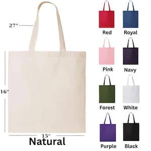 May include: A natural canvas tote bag, 15 inches wide, 16 inches tall, and 27 inches with the handles. The image also shows examples of the tote bag in red, royal blue, pink, navy, forest green, white, purple, and black.