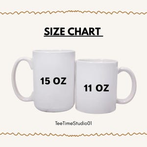 Two white mugs side-by-side labeled 15 oz and 11 oz.