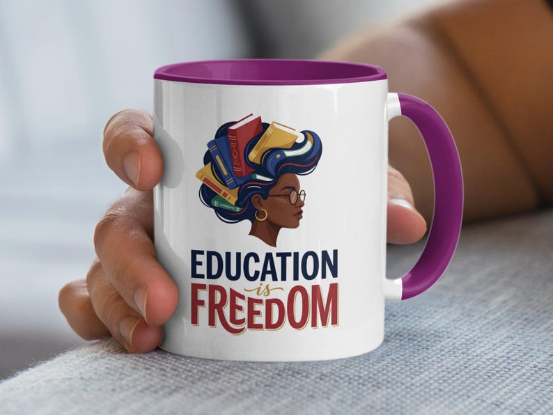 Mug with woman's profile and books forming hair, text reads "Education is Freedom".