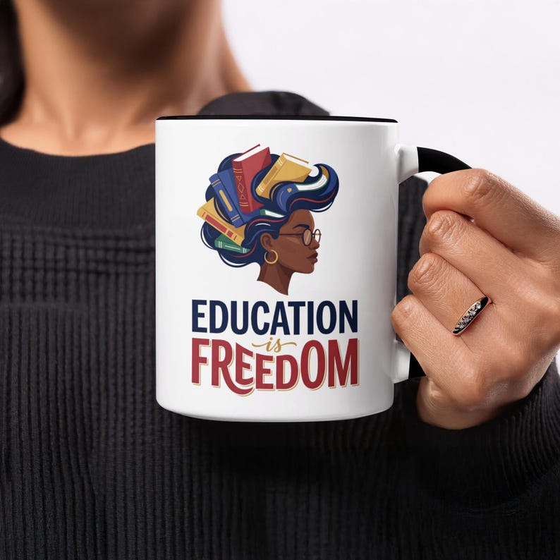 Mug with "Education is Freedom" text and woman with books in hair.