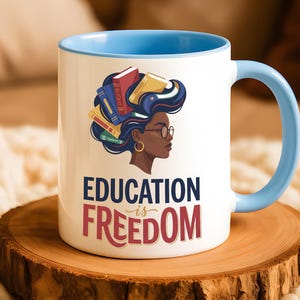 Mug with "Education is Freedom" and woman with books in hair.