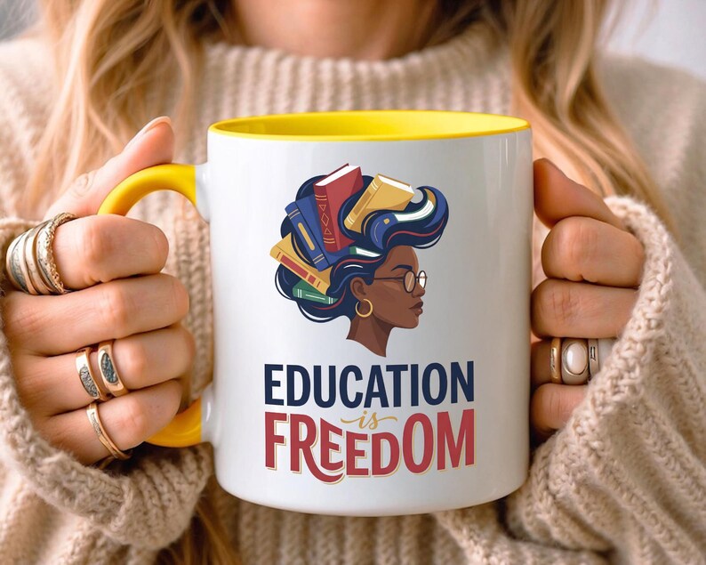 Yellow-rimmed mug with "Education is Freedom" text and colorful books.