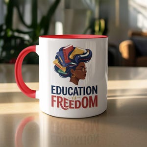 Mug with "Education is Freedom" text and illustration of a woman with books for hair.