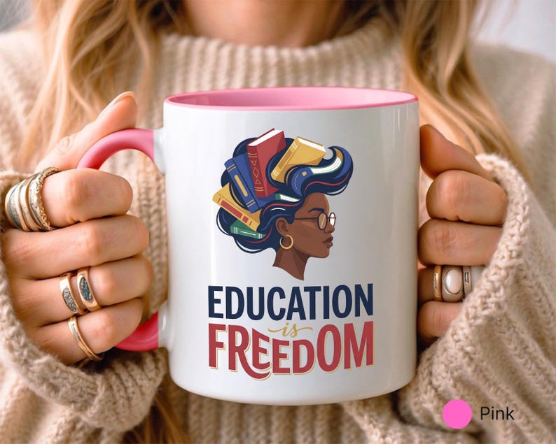 Mug with illustration of woman reading books, text "EDUCATION is FREEDOM".