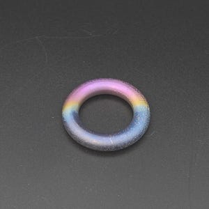 陽極酸化処理されたギャラクシースタイルのチタン製フィジェットコイン - AroundSquare Deadeye Hollow - 世界に一つだけの逸品