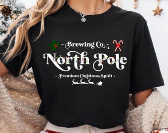 North Pole Brewing Co Santa Tee, Santa Claus Outfit ,Funny Winter unisex Santa Shirt, Christmas Spirits Gift , Xmas Beer Tee Holiday Brew