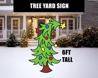 May include: A green Christmas tree yard sign with colorful ornaments and a yellow star on top. The sign is 6 feet tall and has the text "TREE YARD SIGN" at the top.