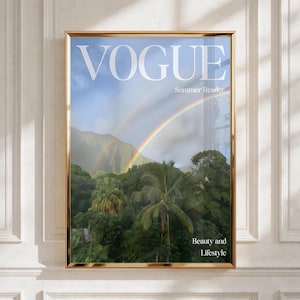 May include: A framed wall art print featuring a magazine cover design with the text VOGUE, Summer Reader, and Beauty and Lifestyle. The image displays a vibrant rainbow arching over lush green tropical mountains and dense palm tree foliage.