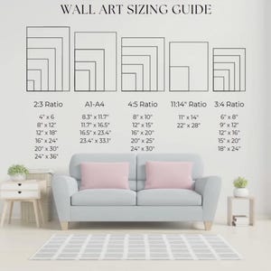 May include: A wall art sizing guide chart displaying five distinct aspect ratios with corresponding dimensions in inches, including 2:3, A1-A4, 4:5, 11:14, and 3:4 ratios, presented as black line drawings on a white background above a light gray sofa.