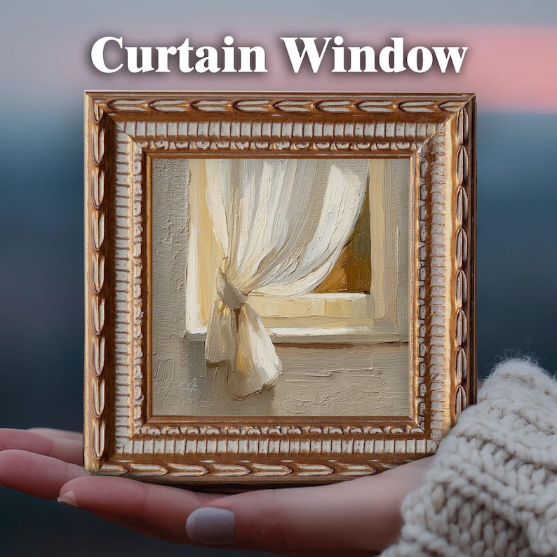 May include: A small framed painting titled "Curtain Window" depicts a window with a white curtain tied back. The painting has a gold-colored ornate frame. The background is blurred, with a gradient of pink and blue.