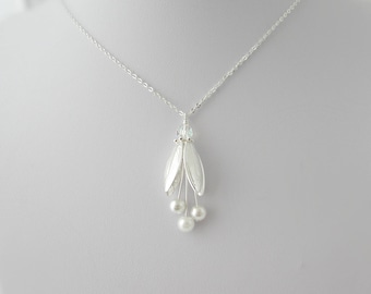 Jingle bell on sale flower necklace hallmark