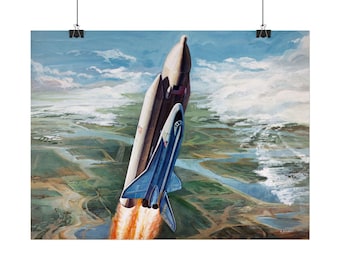 May include: A poster print of a space shuttle launching into the sky. The shuttle is blue and white, with a large brown booster rocket. The background shows a landscape with rivers and fields under a cloudy sky. The print is held by two black clips.