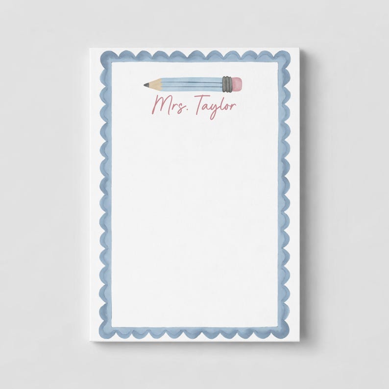 May include: A rectangular notepad with a white center and a scalloped light blue border. At the top, there is a horizontal illustration of a light blue pencil with a pink eraser. The text Mrs. Taylor is printed in a pink script font below it.