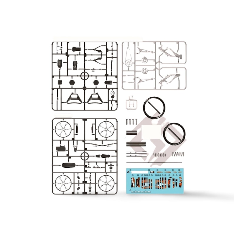 May include: A model kit of a bicycle, featuring various plastic parts still attached to their frames. The kit includes wheels, handlebars, and other components, with a small blue sheet of decals. The parts are in black and gray.