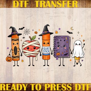 May include: A DTF transfer print featuring a cartoon orange crayon, a mummy apple, an orange glue stick, a purple notebook, and a pencil ghost, all wearing witch hats or costumes. The text reads DTF TRANSFER, CUSTOM PRINT, and READY TO PRESS DTF.