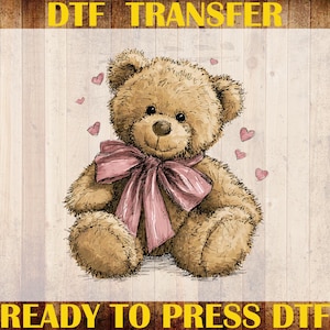 May include: A DTF transfer featuring a cute teddy bear with a pink bow and hearts. The text "DTF TRANSFER", "CUSTOM PRINT", "HEAT TRANSFER", and "READY TO PRESS DTF" are displayed in yellow.