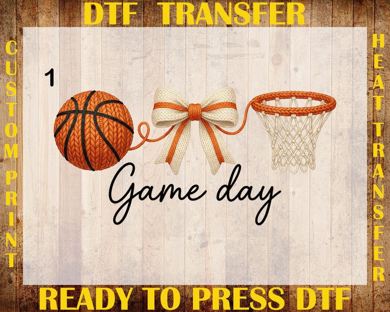 May include: A basketball, bow, and net graphic with the words "Game day." The design is in orange and white, with the text "DTF TRANSFER" and "READY TO PRESS DTF" in yellow. The background is a light wood grain.
