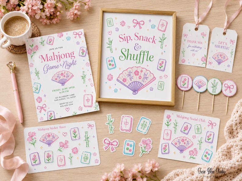 A selection of Mahjong party stationery, including invitations, framed art, gift tags, and stickers. The designs feature a fan, flowers, and game tiles in pastel pink, purple, and green. The framed art reads "Sip, Snack & Shuffle."