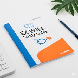 May include: A study guide titled "EZ WILL Study Guide" with a blue spine and orange accent. The cover features the Canon logo and a blue and orange graphic. A blue pencil and a keyboard are also visible.