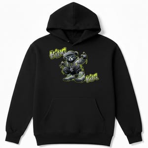 May include: A set of three ceramic mugs with a speckled, matte finish. The mugs are in shades of cream, light gray, and dark gray. Each mug has a simple, minimalist design, perfect for coffee or tea.