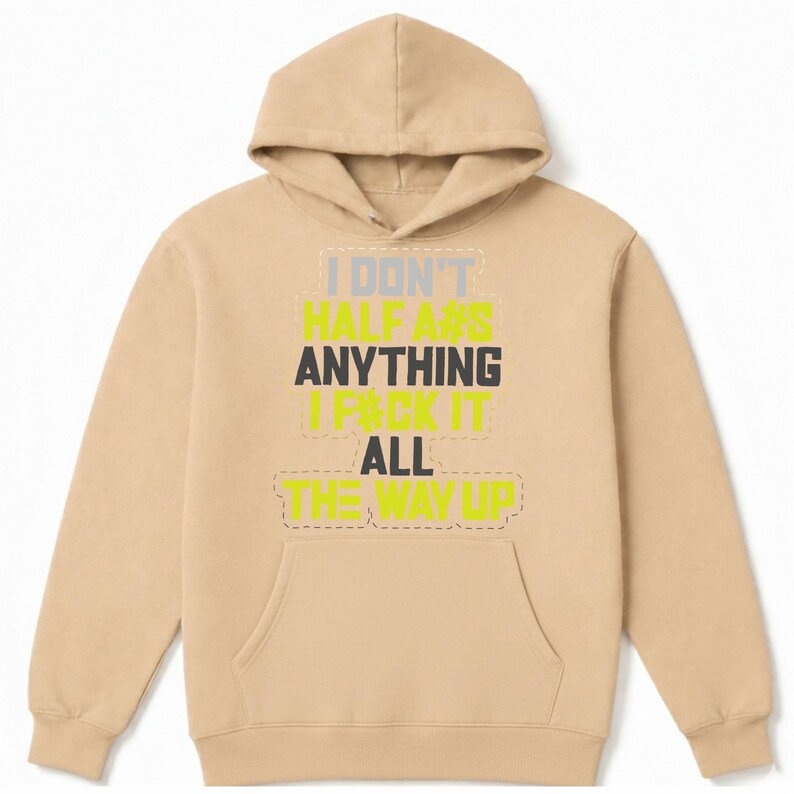 May include: A tan hoodie with a front pocket and a drawstring hood. The front of the hoodie features the text "I DON'T HALF ASS ANYTHING I PACK IT ALL THE WAY UP" in a mix of colors including yellow, gray, and black.