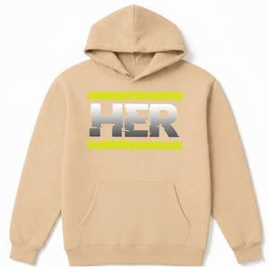 May include: A tan hoodie with a front pocket and a hood. The word "HER" is printed across the chest in a gradient gray and white font, with two horizontal neon green bars above and below the text. The hoodie is made of a soft material.