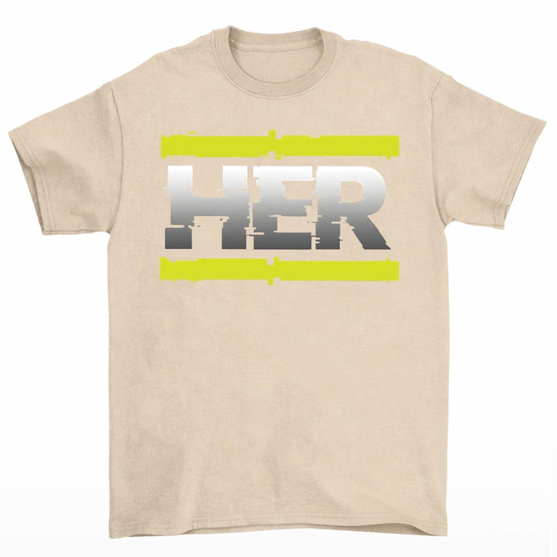 May include: A beige t-shirt featuring the word "HER" in a gradient of gray and white, with a neon green horizontal bar above and below the text. The shirt has short sleeves and a crew neck.