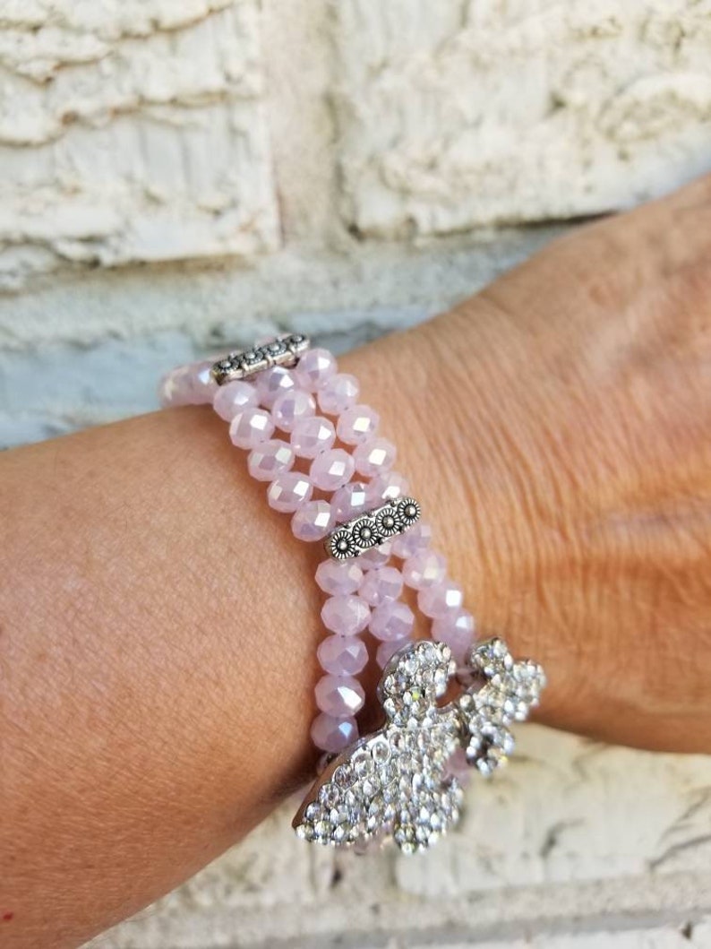 Pink Fleur de lis pink crystal bracelet 8in.