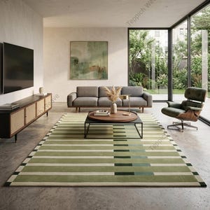 May include: A modern living room featuring a green and white striped rug, a gray sofa, and a black coffee table with a wooden top. A large window offers a view of the outdoors. A black TV is mounted on the wall.