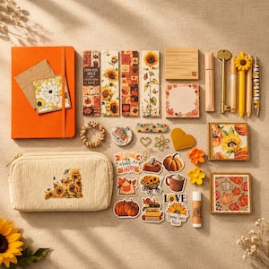 May include: A collection of autumn-themed stationery including an orange notebook, sunflower bookmarks, a corduroy pencil case, pumpkin and sunflower stickers, sticky notes, a gold key pen, and various floral and seasonal decorative accessories.