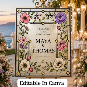 Puede incluir: Un letrero de bienvenida de boda sobre un caballete, con detalles florales y el texto "Welcome to the Wedding of Maya & Thomas". El letrero tiene un efecto de vidriera con flores rosas, moradas y blancas. El letrero también incluye el texto "Editable In Canva" y "Instant Download."