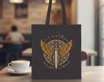 Bolso de mano "In Love I Rise" con alas y espada del Arcángel Miguel, geometría sagrada y espiritual.
