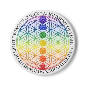 May include: A round sticker featuring a colorful design with a rainbow gradient and geometric patterns. The design includes symbols representing chakras and the text "WINGED CODEX * ALIGNMENT OF LIGHT". The sticker has a white border.