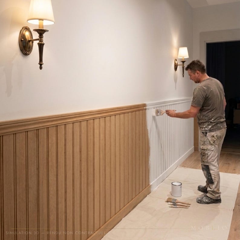 May include: A hallway wall featuring vertical wood paneling with a chair rail, partially painted white. Two brass wall sconces with white shades are mounted above. A paint can and brushes sit on a drop cloth on the floor near the wall.