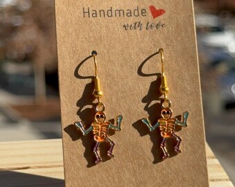 Orecchini scheletro danzante