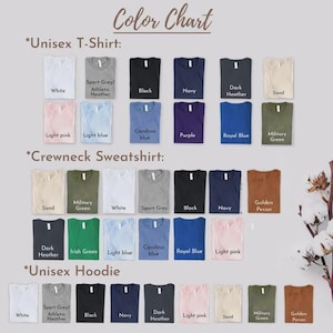 May include: A color chart displays various t-shirts, crewneck sweatshirts, and hoodies in different colors. The chart includes colors like white, black, navy, and light pink. The text "Color Chart" is at the top.