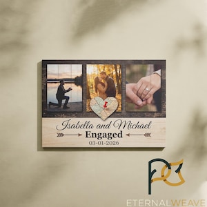 May include: A wooden photo frame with three images. The top section features three photos, and the bottom section has the names "Isabella and Michael" with the word "Engaged" and the date "03-01-2026". A heart-shaped map is in the center.