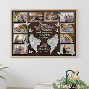 May include: A framed memorial print with a wooden background features multiple photos of an elderly couple. The print includes white angel wings, butterflies, and the text "Because someone we love is in Heaven".