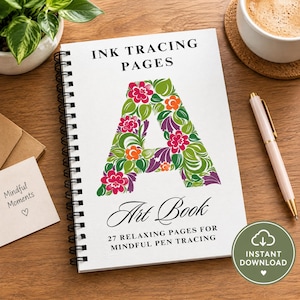 May include: A spiral-bound notebook titled INK TRACING PAGES and Art Book, featuring a large letter A filled with a colorful floral pattern in shades of red, orange, purple, and green. The cover text reads 27 RELAXING PAGES FOR MINDFUL PEN TRACING.