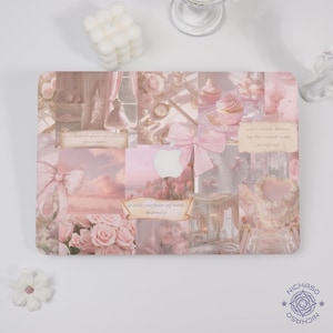May include: A pink laptop skin featuring a collage of images with a soft, romantic aesthetic. The design includes roses, bows, cupcakes, and text overlays. The overall color scheme is pastel pink and white.