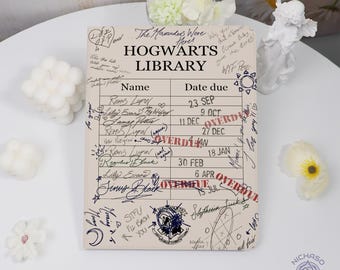 May include: A beige-colored Hogwarts Library notebook with handwritten notes and signatures. The notebook features the text "Hogwarts Library" at the top, with a list of names and due dates. The word "OVERDUE" is stamped on the dates.