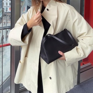 black leather shoulder bag
minimalist leather bag
leather handbag women
small leather shoulder bag
black leather purse
leather crossbody bag
structured leather bag
top handle leather bag
mini leather handbag
leather clutch bag
modern leather handbag
designer style leather bag
sleek leather shoulder bag
everyday leather purse
classic black handbag
premium leather handbag
luxury leather shoulder bag
compact leather bag
elegant leather handbag
soft leather shoulder bag
black minimalist leather